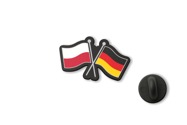 Przypinka flagi Polska-Niemcy to wyrazisty pin do odzieży i akcesoriów, utrzymany w barwach obu państw: bieli i czerwieni oraz czerni, czerwieni i żółci